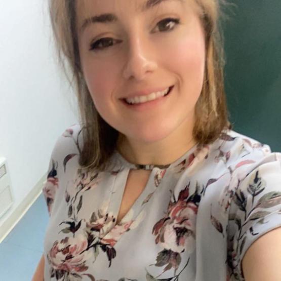  Portrait of young woman in flowered shirt 