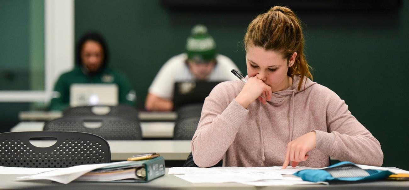 Students study in a classroom