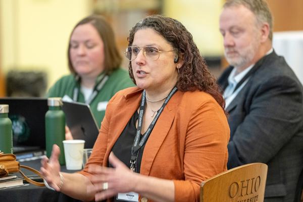 Audience member asks a question at the AI workshop
