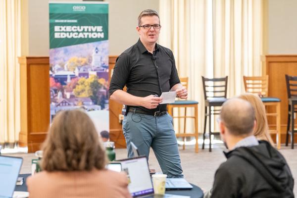 Dr. Marco Habermann answers questions at the AI workshop