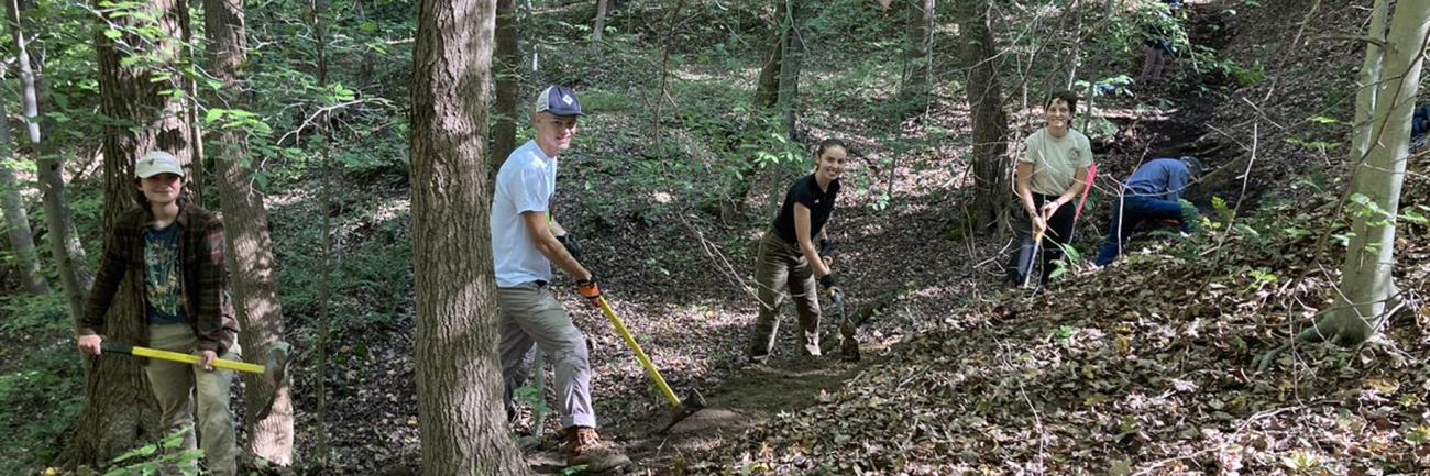 Plant Club members help out at a John Knouse trail building work day Sept. 26, 2021.