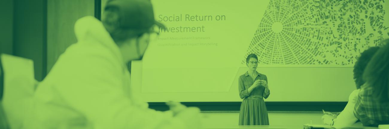 Economics alum Allison Ricket gives a talk on campus.