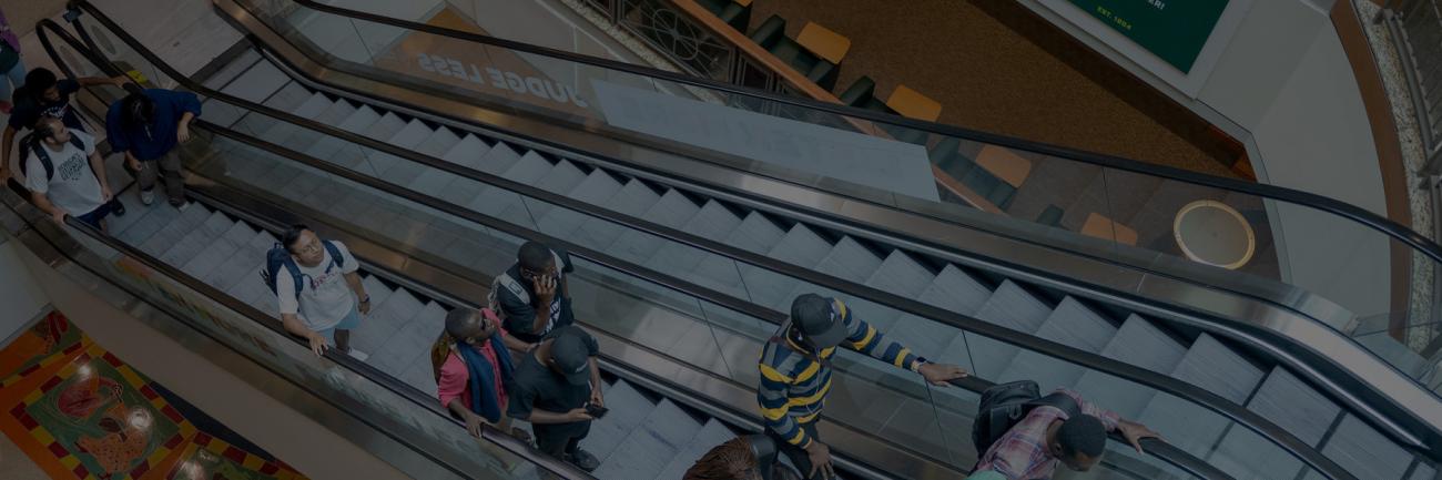 Ohio University students on an escalator