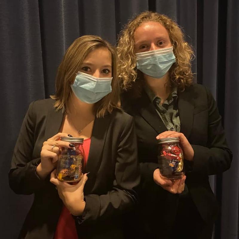 Megan Taylor and Leighton Heiner, with their awards in 2022