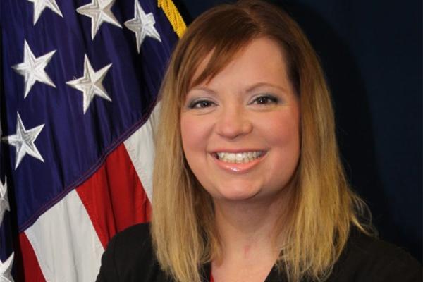 Leah Wolfe, portrait with U.S. flag
