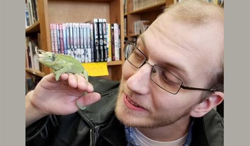 Michael Pierce's profile picture Michael Pierce, portrait with lizard