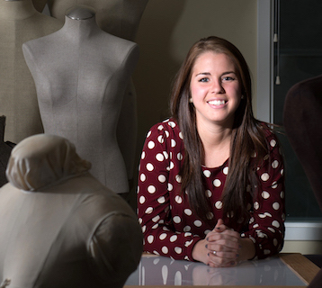 Student in front of mannequins