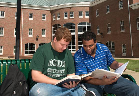 two students from a regional campus working together