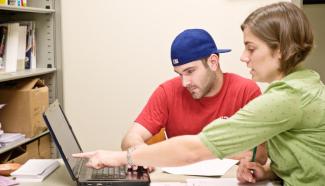 Advisor helping a student select classes