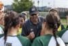 Coach talking to girls team