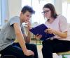 Counselor talking with a student