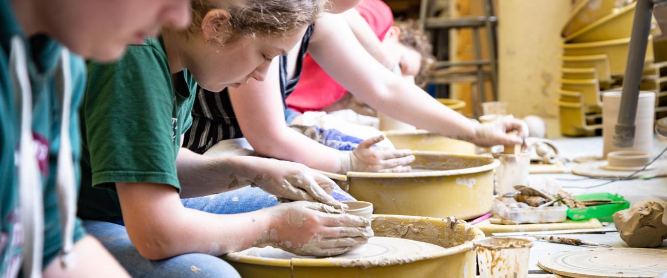 Students at throwing wheel.