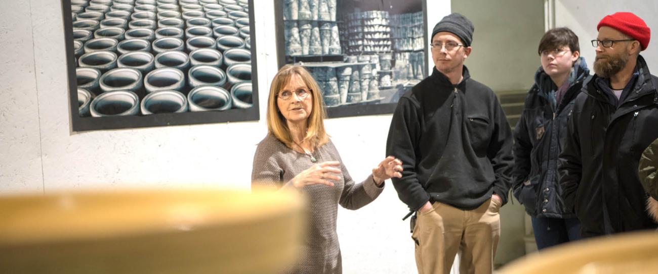 People at a ceramics demonstration