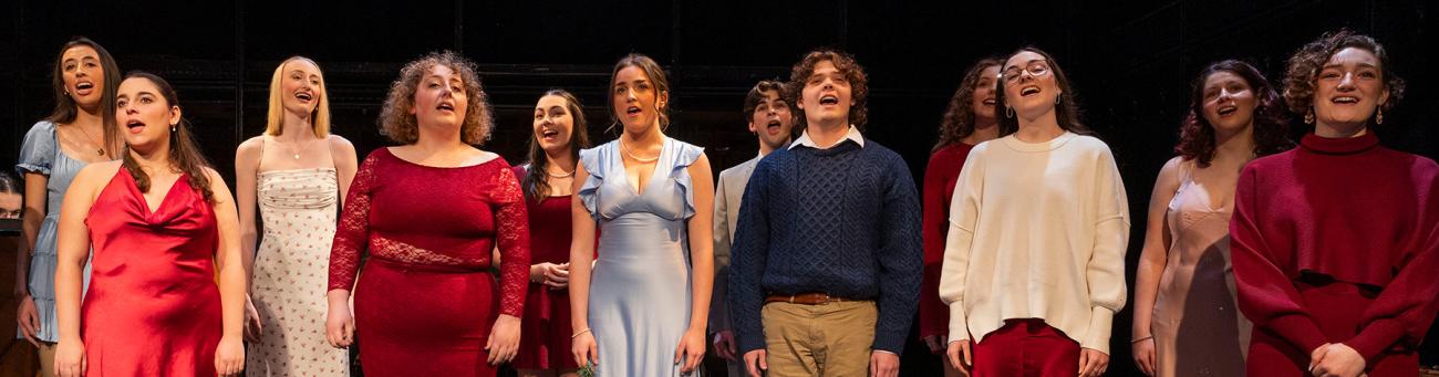 A group of students perform in a play.