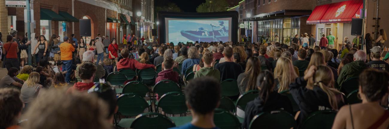 Students watch an Athens International Film + Video Festival film