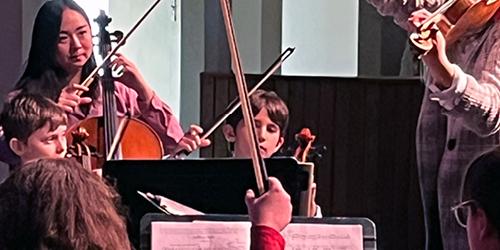 people playing stringed instruments