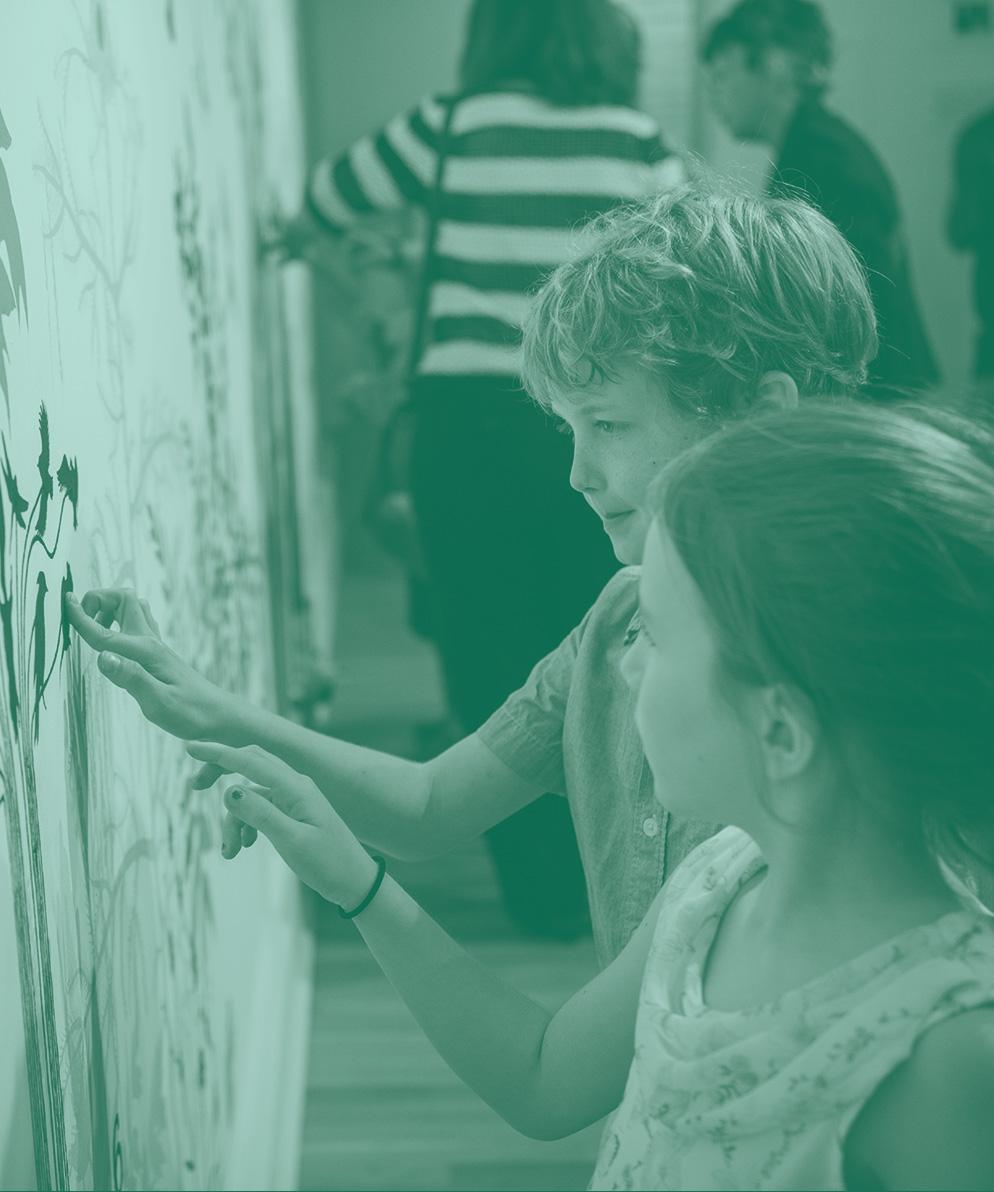 Children touching a wall 