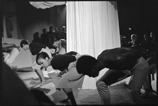 Performers dancing on stage at Black Showcase