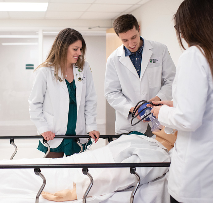 Students working with patient