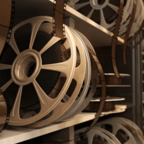 Vintage Film reels lined up on a shelf