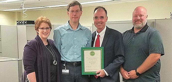 Eric McFadden receives award