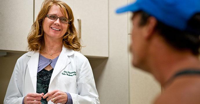 Medical professional and patient