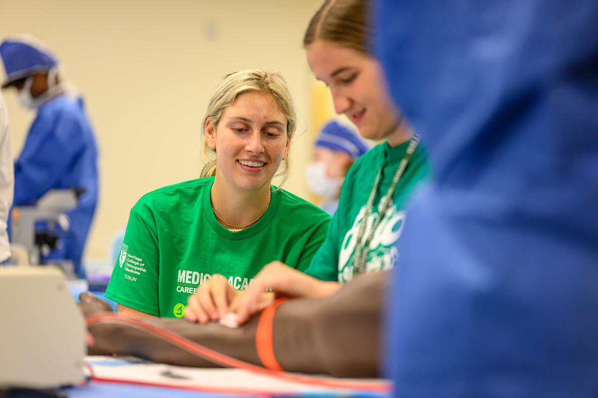 Mentor helping student at Dublin Medical Academy
