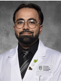 head shot of Jafar Al-Saffar in white coat