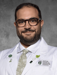 head shot of Joseph Kalout in white coat
