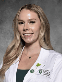 head shot of Skylar Harris in white coat