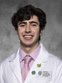head shot of Thomas Shneker in white coat
