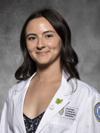 head shot of Camille in white coat