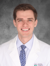 head of student in their white coat
