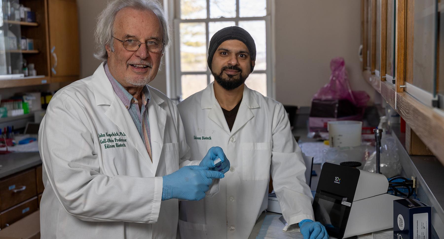 John Kopchick and Reeto Basu in cancer lab