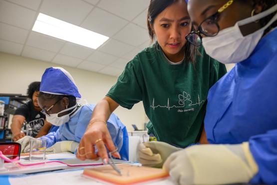 Mentor assisting student at Dublin Medical Academy