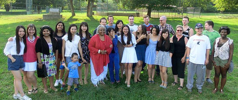 Group of people posing for picture