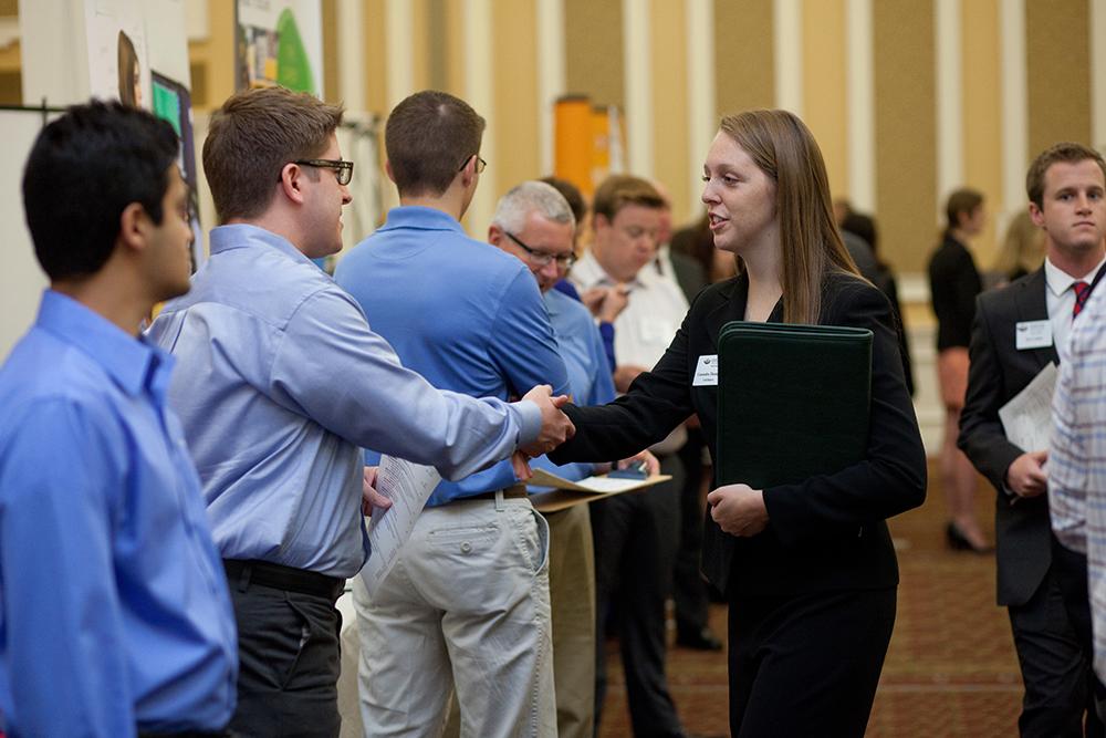 students shaking hands