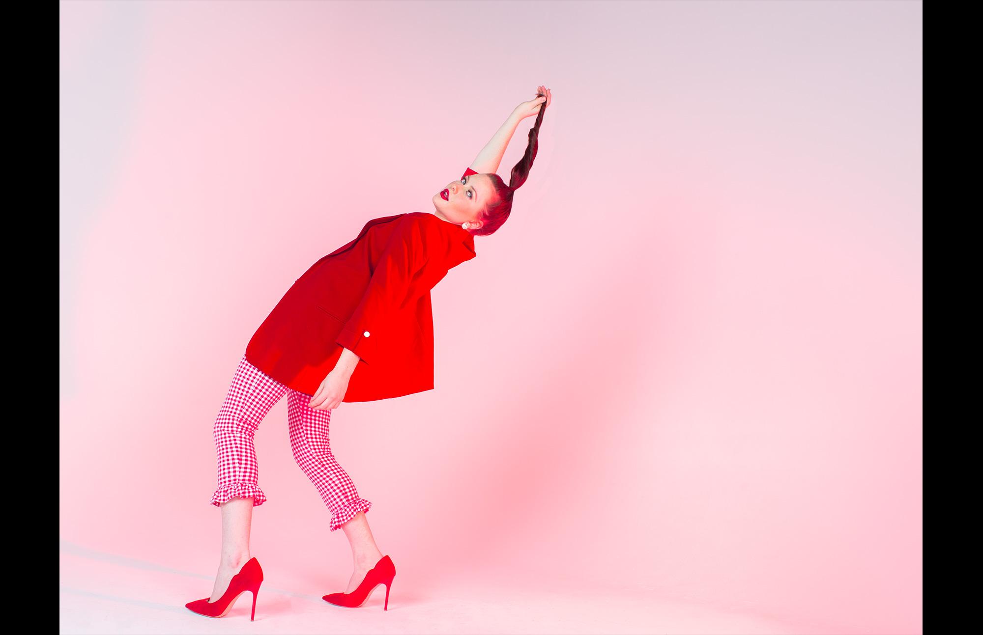 woman in red in studio