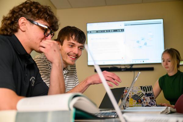 Students discussing a networking project