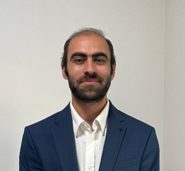 headshot of  Azmat Khan