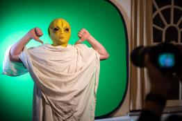 Person dressed as alien in film