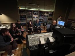 Students observe music producer Joel Hamilton in his Brooklyn studio