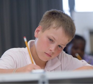 Kid working on assignment.