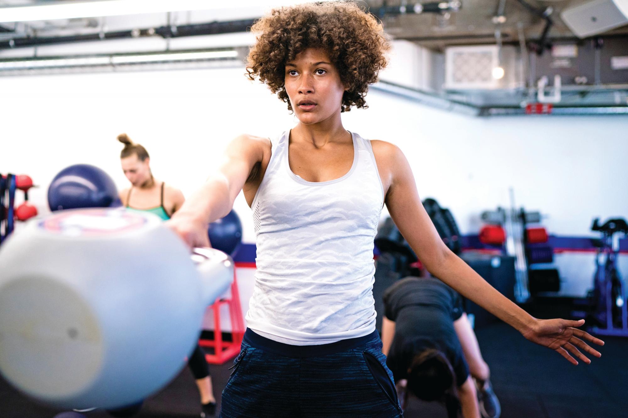 Woman working out with kettlebell
