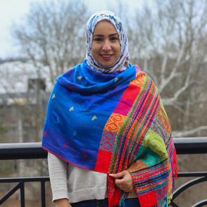 Amal Shimir smiles at the camera