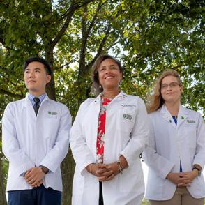 The Humanism in Medicine Club pose and smile together