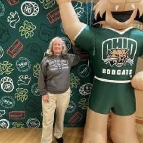 Valerie Young poses with Rufus