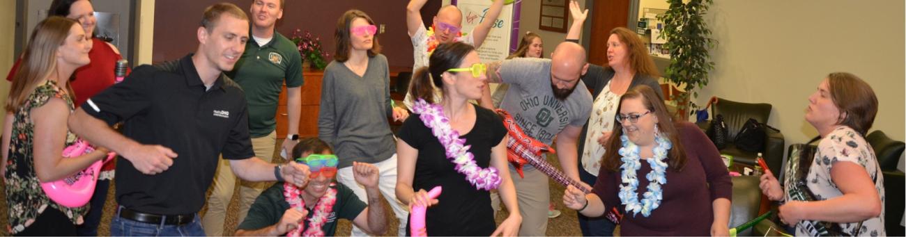 University employees having an office dance party