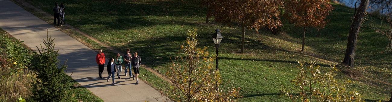Students walking through campus together