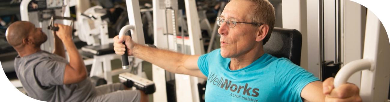 WellWorks members on strength equipment